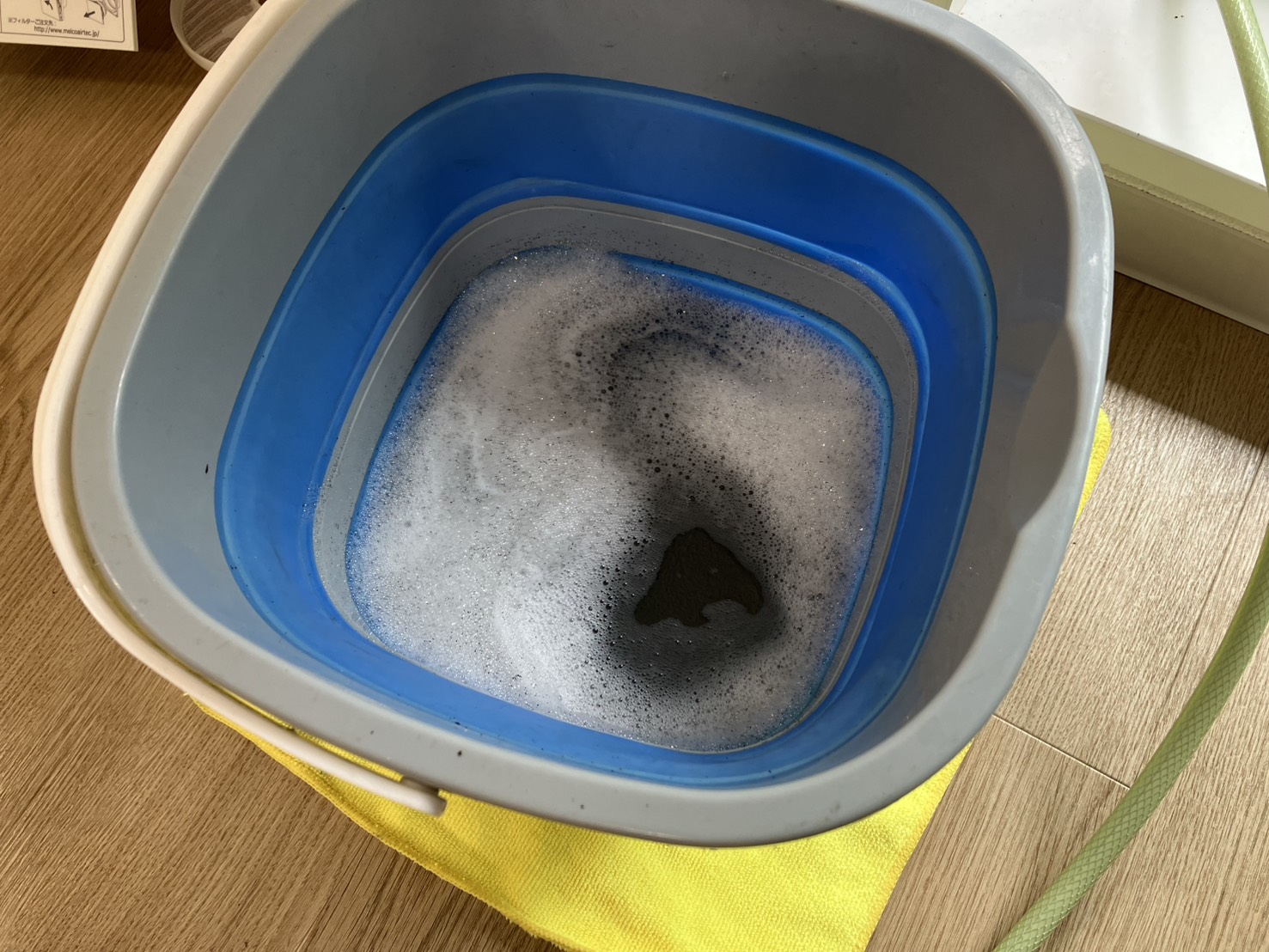 宝塚市川面のエアコンクリーニング 洗浄後の汚水